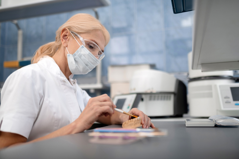 dental-technician-making-artificial-teeth-in-labor-2025-03-09-03-32-32-utc-1