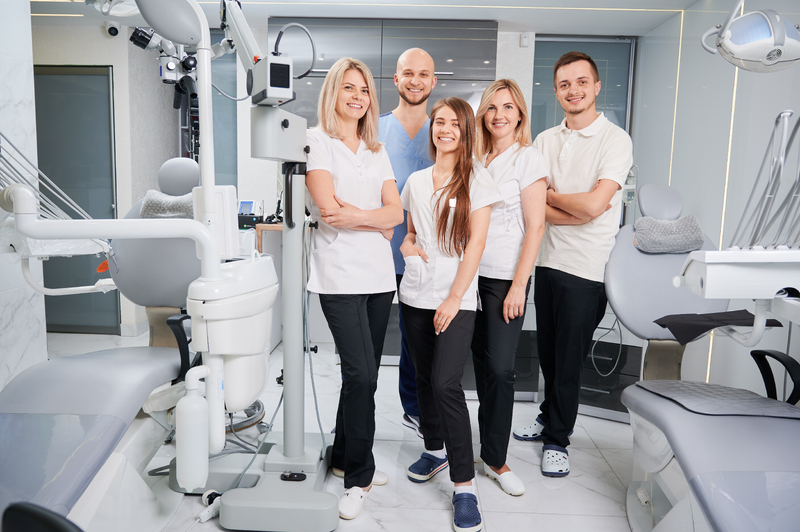 professional-team-of-dentists-and-assistants-posin-2025-01-16-23-33-44-utc-1